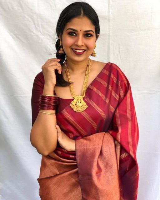 Enrapturing Brown Soft Silk Saree With Precious Blouse Piece