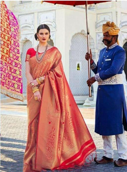 Sterlingly Red Soft Silk Saree With Delightful Blouse Piece