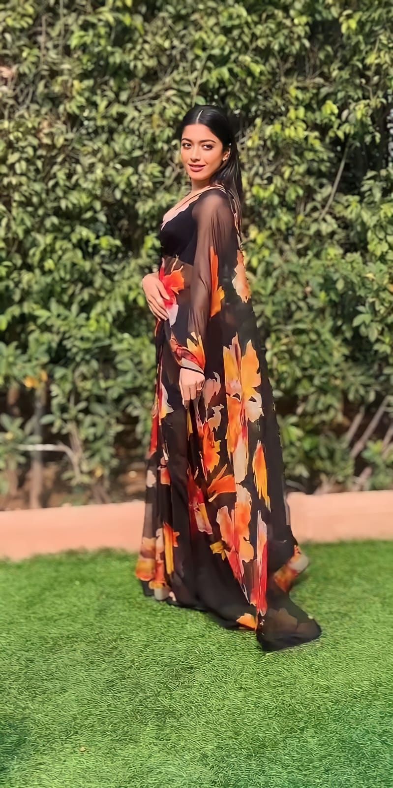 AmarVastra saree packaging with folded black saree and blouse