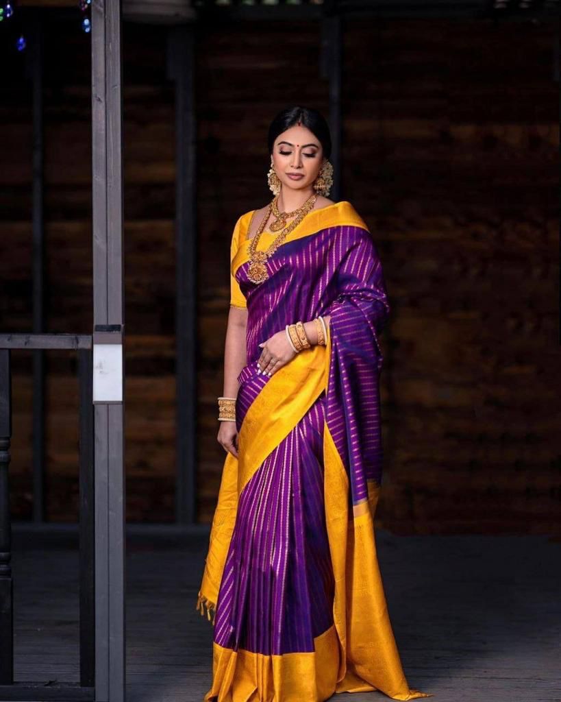 Adorning Purple Soft Silk Saree With Classy Blouse Piece